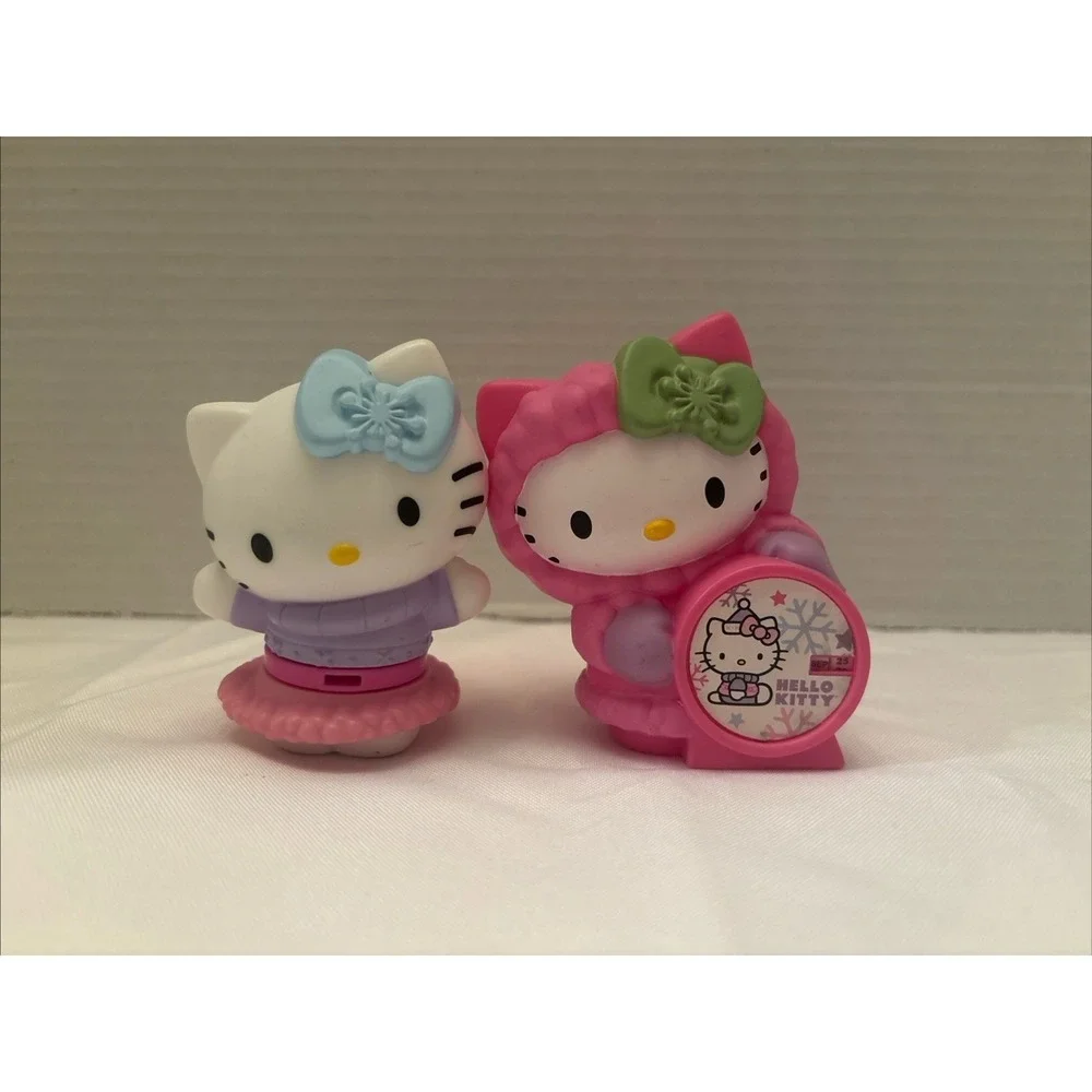 Hello Kitty with Calendar / Windups Happy Meal Toys. collectibles